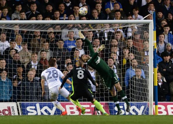 United's Rob Green saves a shot from Brighton's Jiri Skalak.