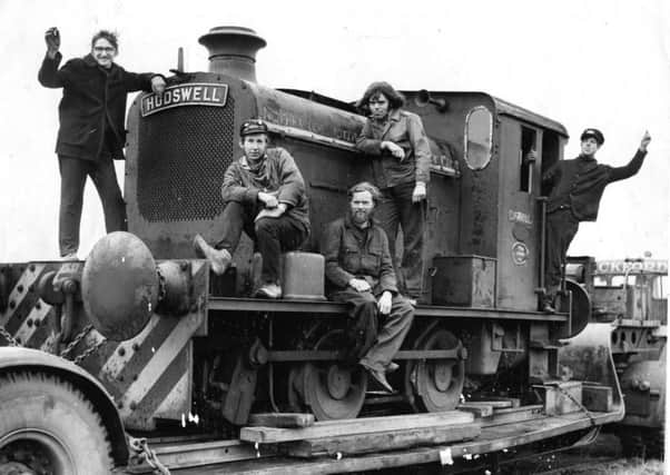 DECEMBER 1969: Members of Middleton Railway Trust are seen here aboard their latest acquisition - a diEsel locomotive built by Hudswell Clarke, of Leeds, which started life 23 years ago shunting at Keighley gas works.