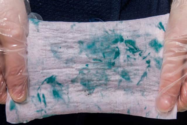 One of the drug testing wipes which turned blue after coming into contact with traces of cocaine.