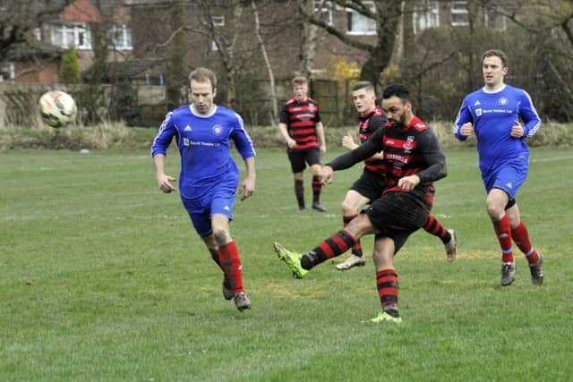 Stanley United's 
Leroy Watson shoots against Alwoodley. PIC: Steve Riding