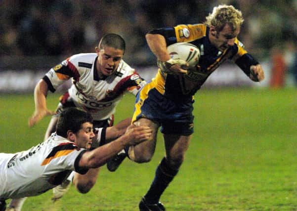 Leeds Rhinos' Rob Burrow, above right, scored two tries against Bradford Bulls at Odsal in March 2005.