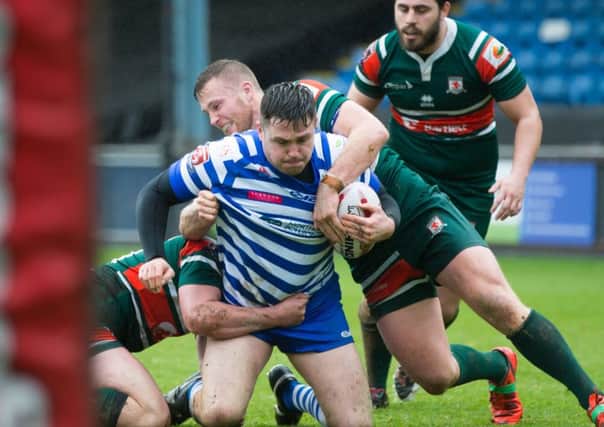 NO GAME: Hunslet's players in action against Halifax last weekend in the Challenge Cup