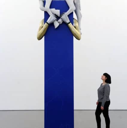 OPENING DAY: Alice Miller viewing the 'Calf Bearer'.