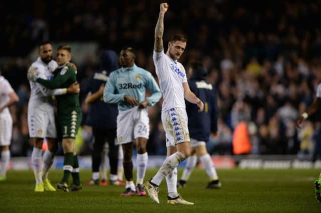 Liam Cooper salutes fans after Leeds' win over Brighton. PIC: Bruce Rollinson