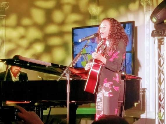 Corine Bailey Rae singing at the event
