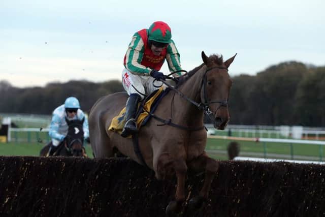 Vieux Lion Rouge ridden by Tom Scudamore. PIC: PA