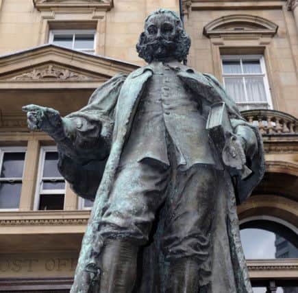 Launch of Talking Statues, which features the voices of stars including Vic Reeves, Brian Blessed, and Game of Thrones star Gemma Whelan. They have recorded voiceovers for iconic statues such as The Black Prince to the lions outside Leeds Town Hall to help bring the city's history to life. Passersby have to swipe their smartphones on nearby plaques to hear their stories. The statue of John Harrison in City Square.
16th June 2016.
Picture : Jonathan Gawthorpe