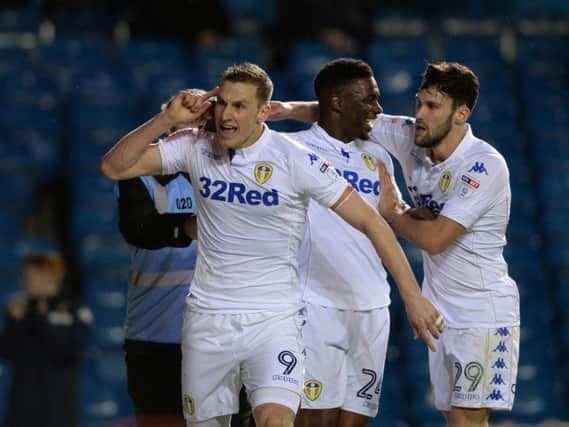 Chris Wood celebrates one of his two goals against Brighton and Hove Albion