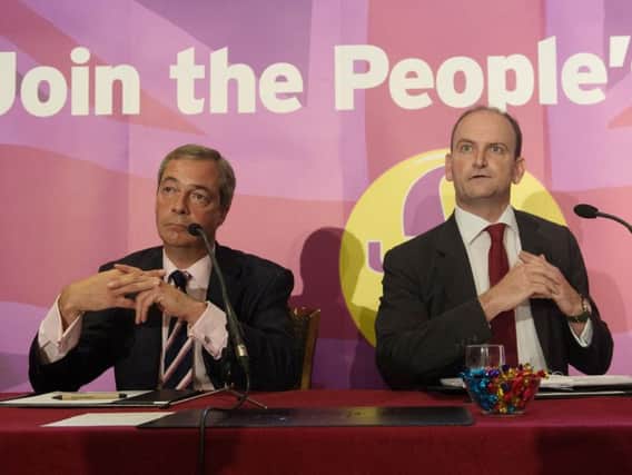 Nigel Farage (left) with Douglas Carswell, Ukip's only MP, who is leaving the party and will sit in the House of Commons as an independent.