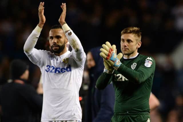 Kyle Bartley and Rob Green applaud the fans.