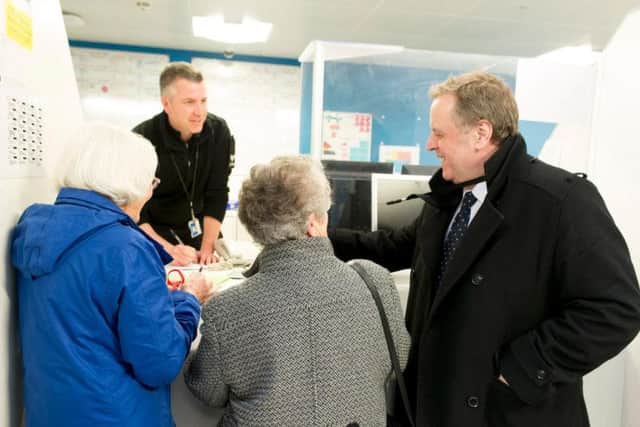 West Yorkshire police and crime commissioner Mark Burns-Williamson, right, is seeking more Independent Custody Visitors.