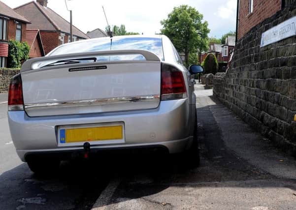 Cars parking on the pavement could soon be banned from doing so and face a Â£70 fine.