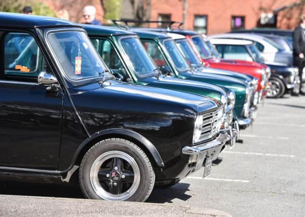 A convoy of classic minis attend the funeral of 18 year old Bradley Parish, a mini enthusiast taken by a suspected heart condition, in Pontefract, West Yorks., March 31 2017. See Ross Parry story RPYMINI:
