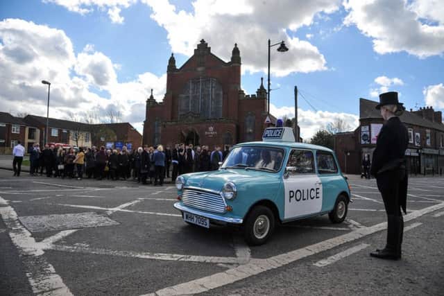 A convoy of classic minis attend the funeral of 18 year old Bradley Parish, a mini enthusiast taken by a suspected heart condition, in Pontefract, West Yorks., March 31 2017. See Ross Parry story RPYMINI: