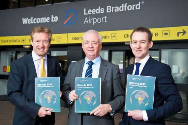 Aviation development director Tony Hallwood, chief executive John Parkin and head of planning development Charles Johnson with the Route to 2030 plan for Leeds Bradford Airport. Picture: Richard Walker/www.imagenorth.net