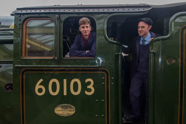 Fireman Matthew Earnshaw and first leg driver Noel Hartley, on the footplate of Flying Scotsman. Picture: James Hardisty.