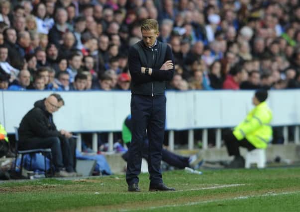 GLOOMY: Leeds United's disappointed boss Garry Monk at the Madejski on Saturday evening. Picture:Tony Johnson.