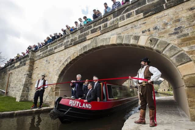 Official re-opening of Elland Bridge. Transport minister Andrew Jones cuts the ribbon