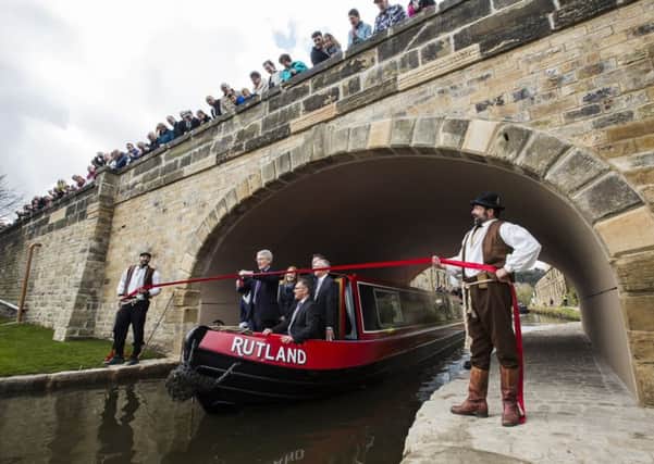Official re-opening of Elland Bridge. Transport minister Andrew Jones cuts the ribbon