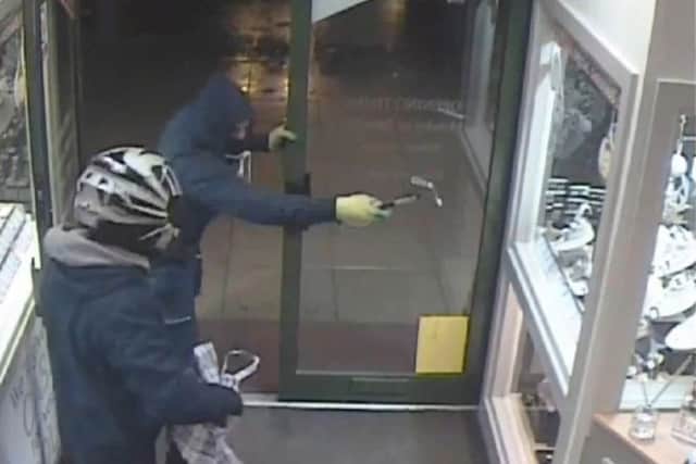 CCTV captures the robbery at a Leeds pawnbrokers