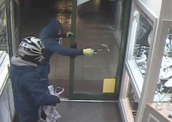 CCTV captures the robbery at a Leeds pawnbrokers