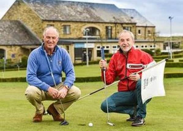 Gordon J Brand, left, with Leeds Golf Centre's operations manager Nigel Sweet.
