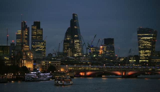 The City of London skyline at dusk  Photo: Jonathan Brady/PA Wire