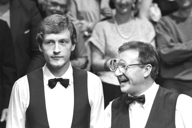 BAIZE OF GLORY: Dennis Taylor (right) and Steve Davis at the end of the World Snooker Championships final at the Crucible Theatre in 1985, which was watched by a TV audience of 18 million.