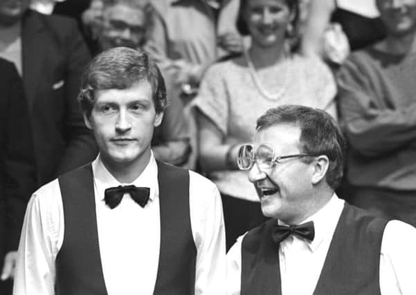 BAIZE OF GLORY: Dennis Taylor (right) and Steve Davis at the end of the World Snooker Championships final at the Crucible Theatre in 1985, which was watched by a TV audience of 18 million.