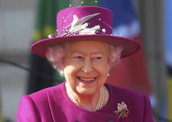 Queen Elizabeth II at the launch at Buckingham Palace, London of The Queen's Baton Relay for the XXI Commonwealth Games being held on the Gold Coast in 2018. PRESS ASSOCIATION Photo. Picture date: Monday March 13, 2017. See PA story ROYAL Commonwealth. Photo credit should read: Toby Melville/PA Wire