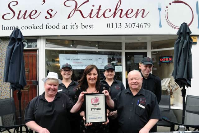 Yorkshire Evening Post Cafe of the Year.
YEP Editor Hannah Thaxter presents Ian and Sue Swain and their staff at Sue's Kitchen in Morley, with their second place.
13th April 2017.
Picture Jonathan Gawthorpe