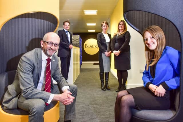 from left to right: Chris Allen (seated), Andrew Smith, Beth Laidler, Lucy Rigden, Jennifer Roberts (seated). Blacks Solicitors has moved to a new home in the heart of Leeds