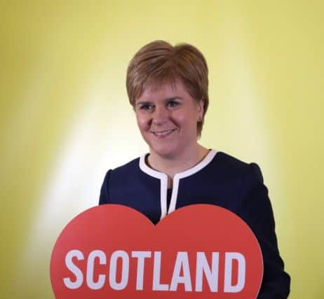 First Minister and SNP leader Nicola Sturgeon visits a photo booth during the SNP Spring Conference at the AECC in Aberdeen. PRESS ASSOCIATION Photo. Picture date: Friday March 17, 2017. See PA story POLITICS SNP. Photo credit should read: Andrew Milligan/PA Wire
