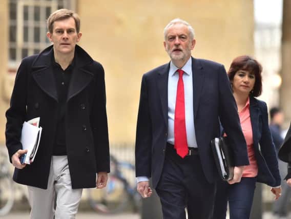 Labour leader Jeremy Corbyn arrives with his wife Laura Alvarez and senior aide Seumas Milne at Broadcasting House in central London to appear on the BBC1 current affairs programme, The Andrew Marr Show.