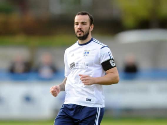 Guiseley captain Danny Lowe forced the ball home for the equaliser
