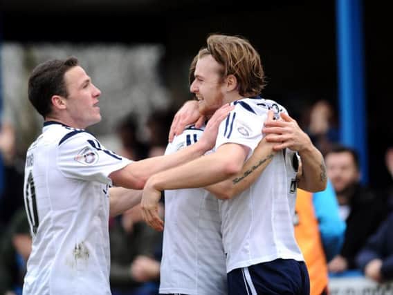 Guiseley have beaten the drop on the final day of the season for a second successive season