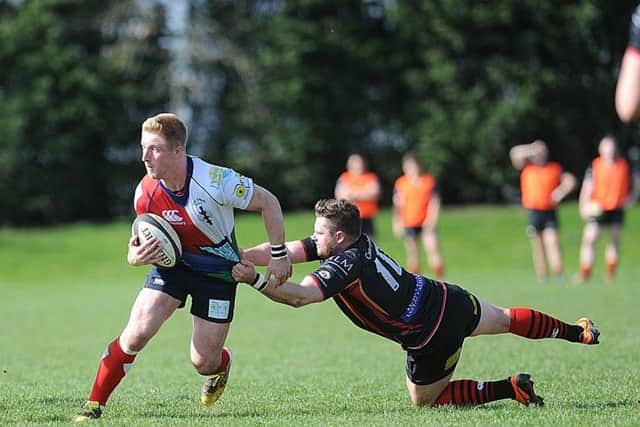 Hull Ionians' Callum Irvine, left.