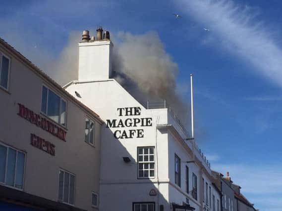 Smoke coming from the roof of The Magpie Cafe in Whitby today.