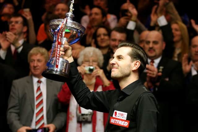 Mark Selby celebrates winning the Betfred Snooker World Championship at the Crucible Theatre in Sheffield. Picture: Steven Paston/PA Wire