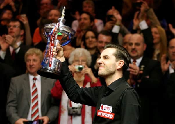 Mark Selby celebrates winning the Betfred Snooker World Championship at the Crucible Theatre in Sheffield. Picture: Steven Paston/PA Wire