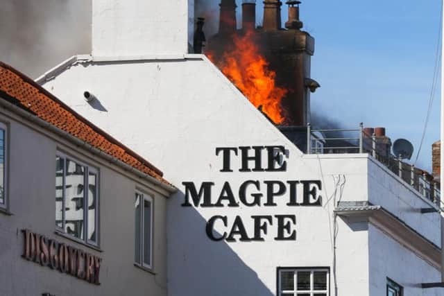 Flames can be seen through the roof of the Magpie for the second time in less than 24 hours
Picture by Ceri Oakes