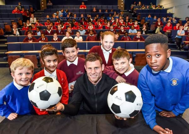 A 100 schoolchildren quizzed Liverpool FC midfielder James Milner at Leeds Trinity University last month. Picture Simon Dewhurst.