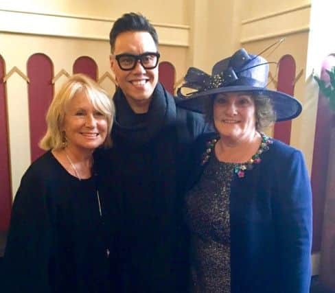 Gok Wan with Gini Palmer, left, of Harrogate's Julie Fitzmaurice,  which provide the outfit for makeover nominee Liz Blackburn.