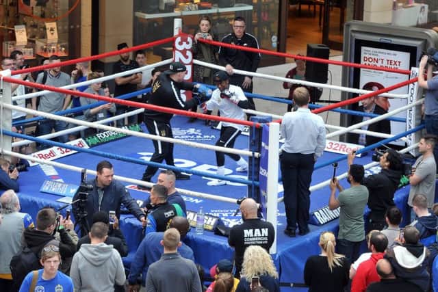Crowds gather to watch the sparring session. Picture: Tony Johnson.