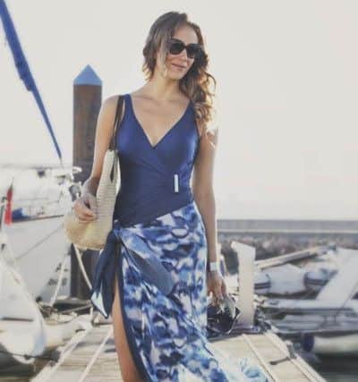 The V-neck wrap style - Blue swimsuit, Â£76; blue and white pareo, Â£50. From a selection at Seaspray.