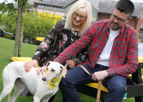 Lola with new owners Bianca and Craig Stollen, who read about her plight in the YEP.