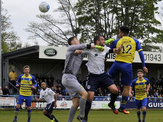 Danny Lowe heads home in the 90th minute against Solihull Moors to keep Guiseley in the National League