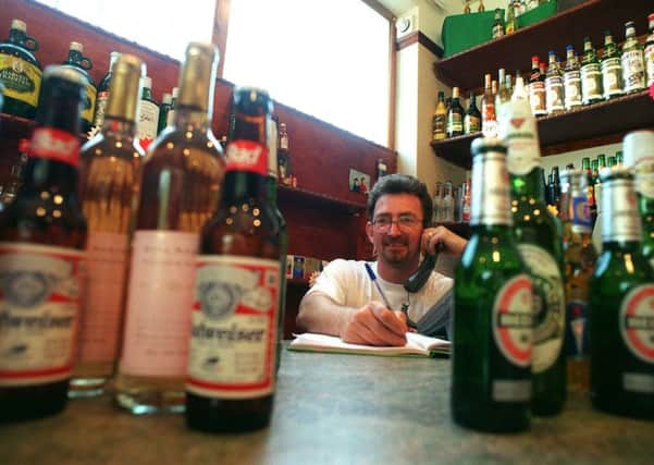 Alotta bottle...Andy Heald pictured at Dial-A-Drink, at the Wine Basket, Beeston, Leeds.
