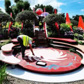 FINISHING TOUCHES: An exhibitor works on final preparations at the world famous RHS Chelsea Flower Show in London before the event opens to the public.