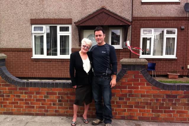 13 June 2014.......   Collect picture of Spend Spend Spend pools winner Viv Nicholson who now has dementia with her son Howard Nicholson taken outside their old house in Castleford 3 years ago